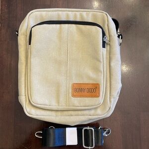 NWOT Bonny Dodo canvas bag with shoulder strap. Wheat color, black trim.